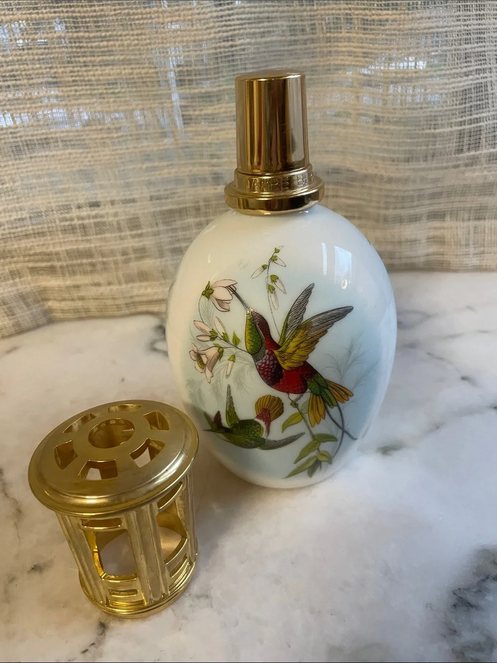 a vintage Lampe Berger Limoges Porcelain Hummingbird Fragrance Lamp